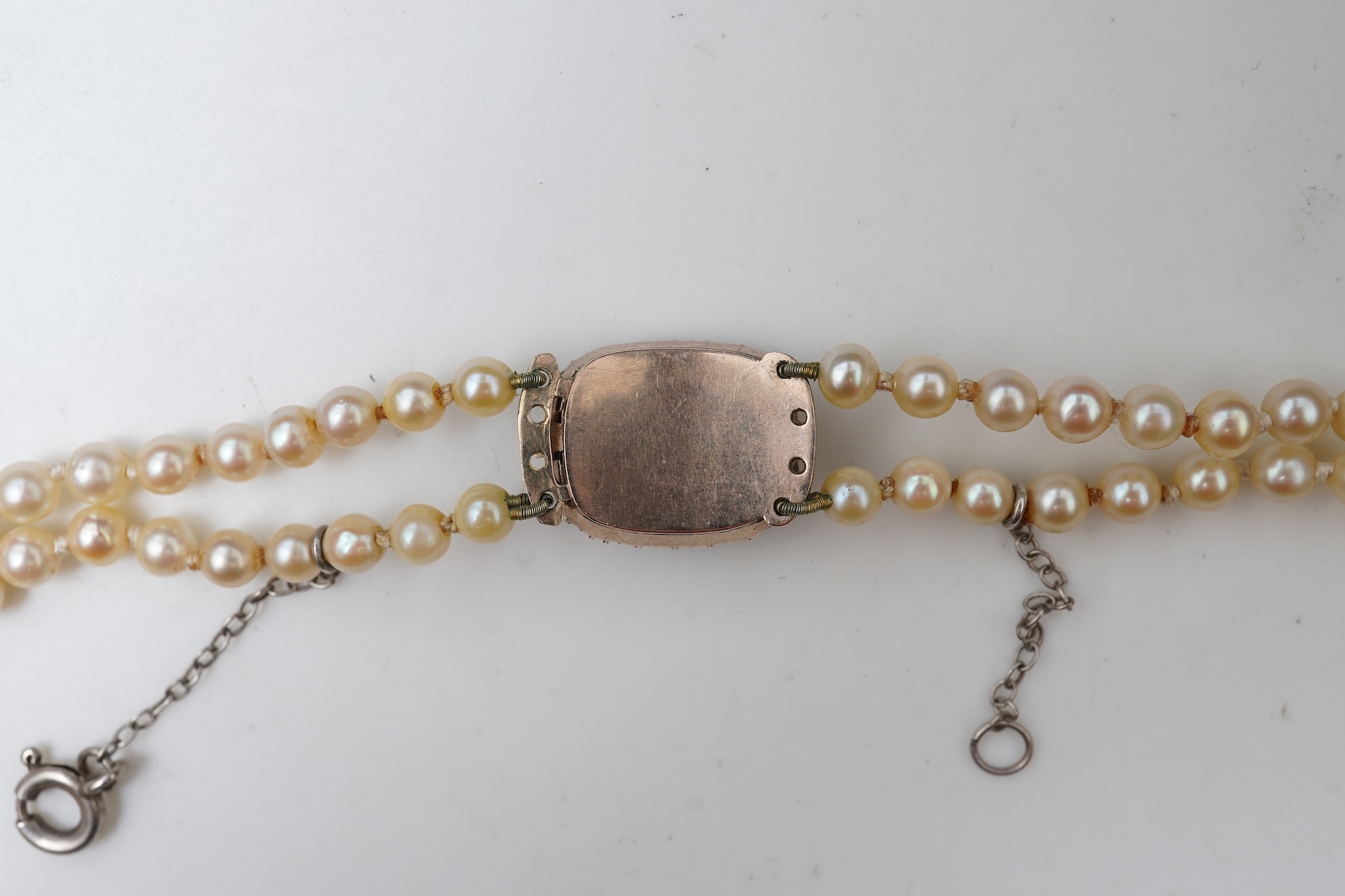 A cultured pearl and garnet necklace, 19th century and later